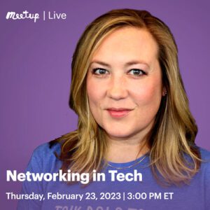 A woman wearing a purple shirt is engaged in networking conversations within the tech industry.